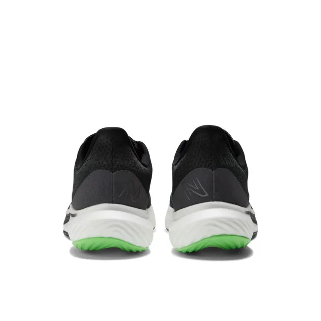 Heels of New Balance Men's Fuelcell Rebel V3 Running Shoes in black and vibrant green