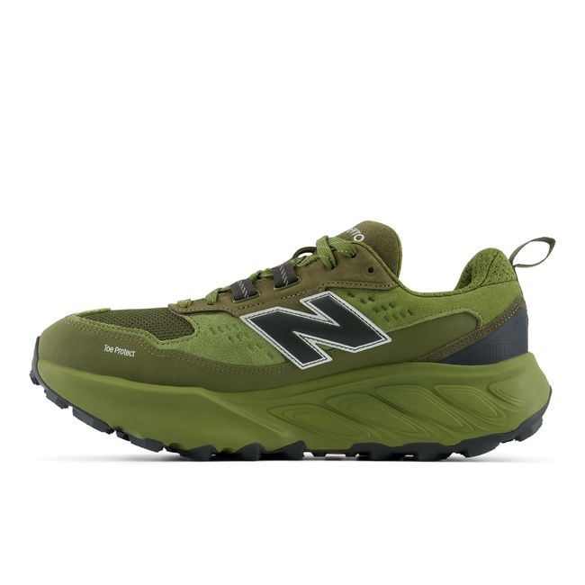 Medial profile of the New Balance Hierro Trek in olive green with black accents