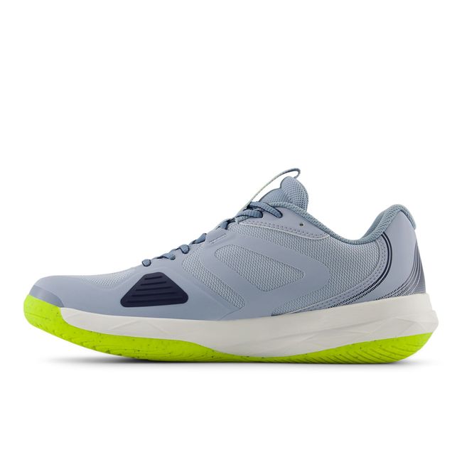 Medial profile of the New Balance SmashStep PKL in pale blue with a cream midsole