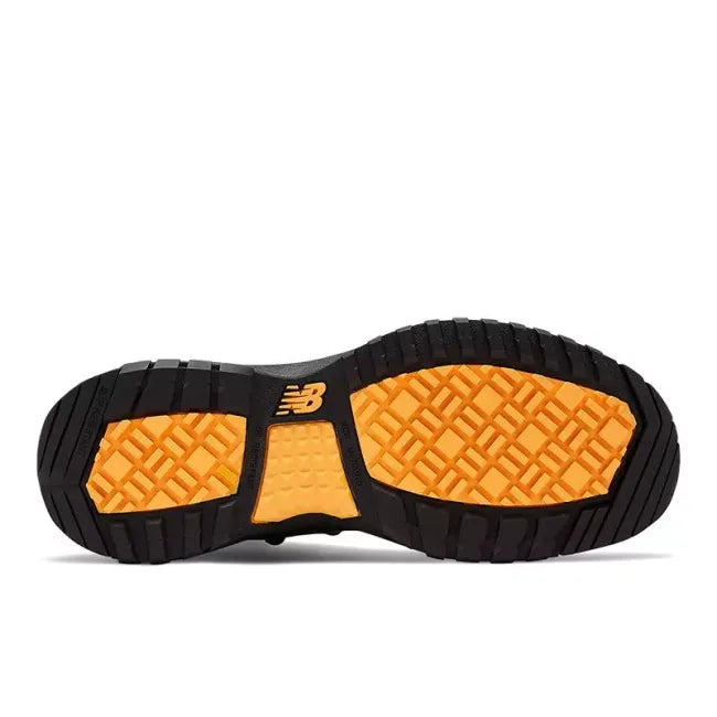 Slip resistant sole of New Balance 989 Composite Toe Work Boot in black and orange