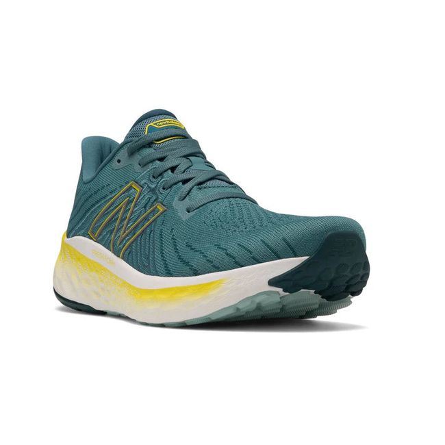 Front angled view of New Balance Men's Fresh Foam X Vongo V5 Running Shoe in Deep Sea Sulphur Yellow