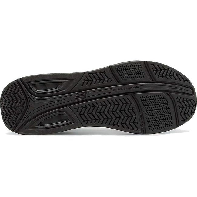 Sole of New Balance 928 Men's Stability Walking Shoe with Rollbar in Brown leather.