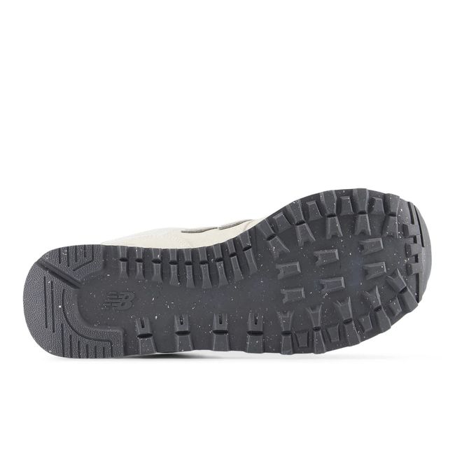 Black sole of New Balance Women's 574 Lifestyle Shoe in Lenin Sea Salt Beige Suede