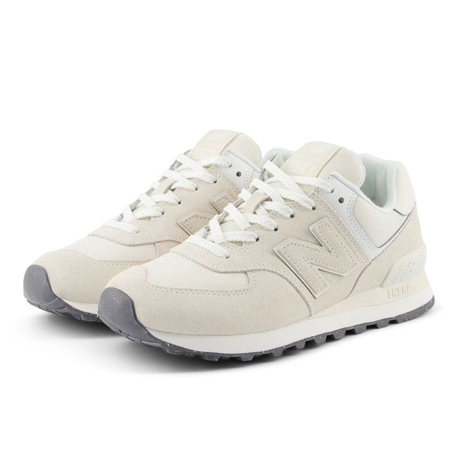 Pair of New Balance Women's 574 Lifestyle Shoes in Lenin Sea Salt Beige Suede