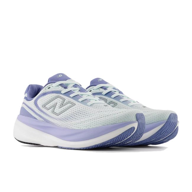 Women’s New Balance 1080 V15 running shoes in light blue and lavender, angled pair view
