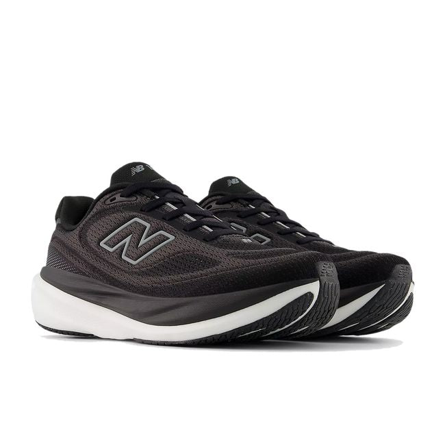 Women’s New Balance 1080 V15 running shoes in black and white, angled pair view