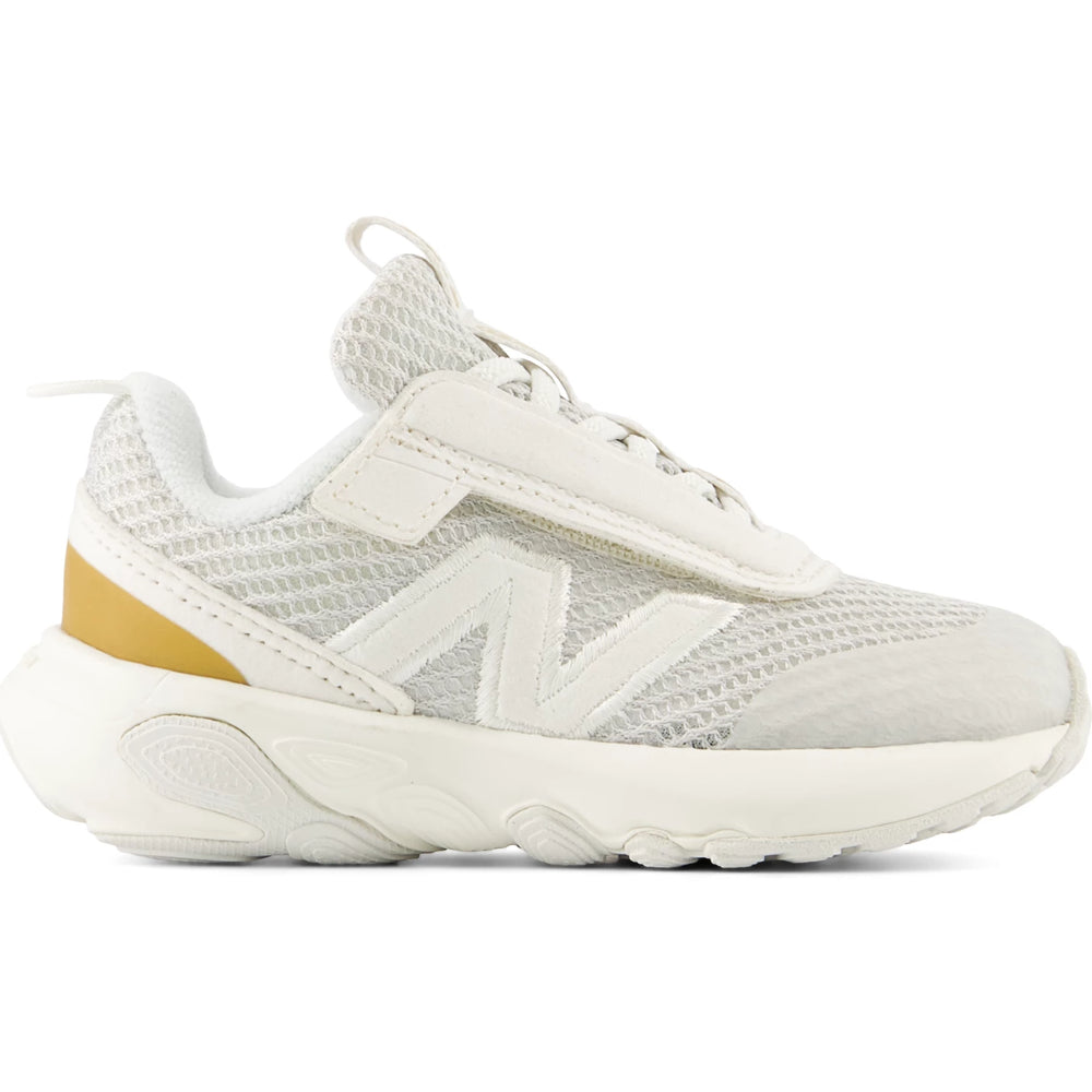 Side of New Balance Kids' 1440 running shoe in Sea Salt