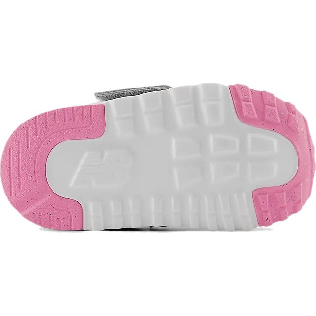 Sole of Toddler New Balance 574 Lifestyle Sneaker in Gray and Pink