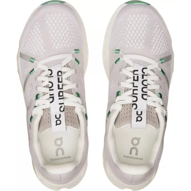Top-down view of a white On Running On Cloud Cloudsurfer running shoe with mint green details