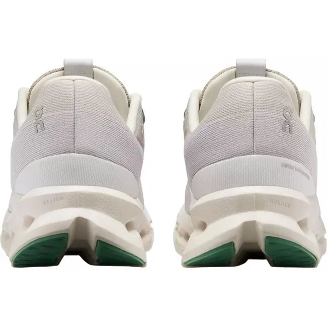 Heels of a white On Running On Cloud Cloudsurfer running shoe with mint green details
