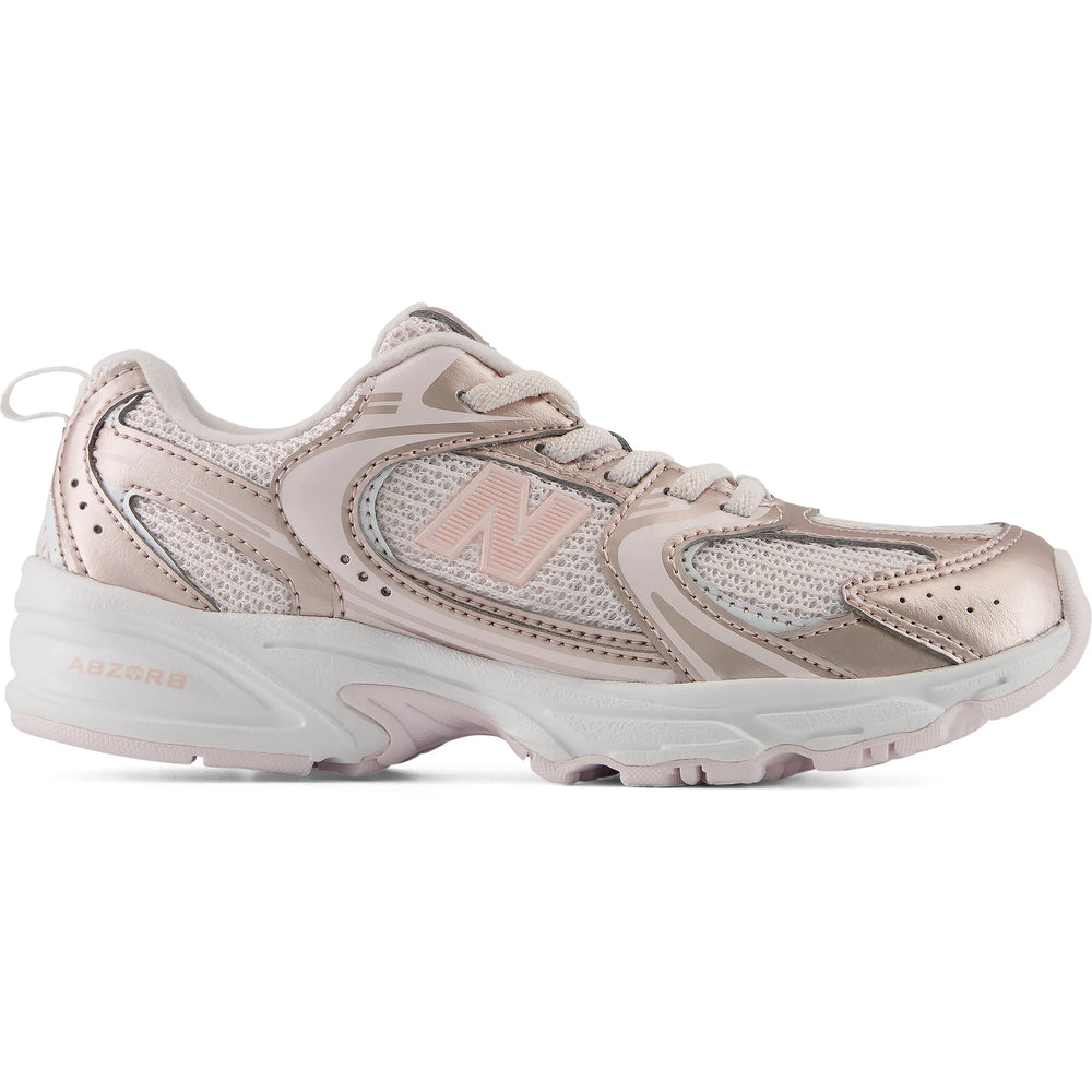 Side of New Balance Kids' 530 sneaker in Shell Pink/Pink Salt