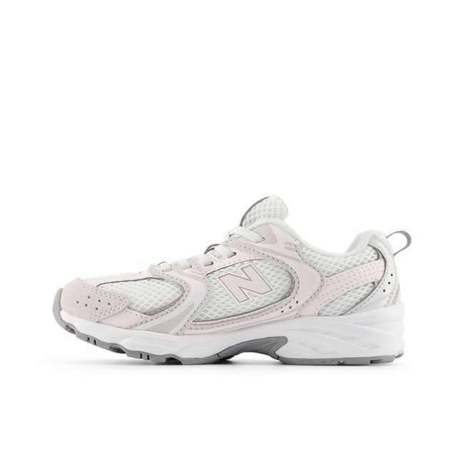 New Balance Kids' 530 Bungee Lace shoe in grey matter and pink salt, medial view.