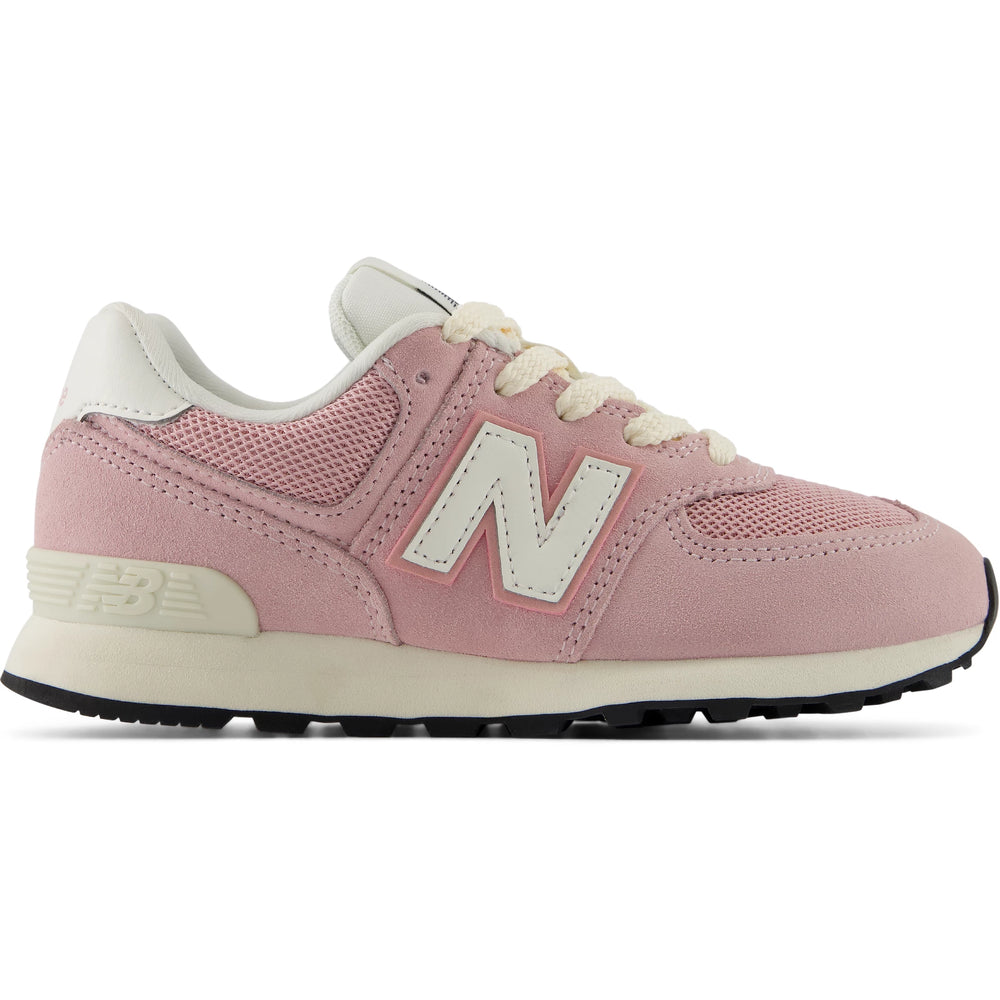 Side of New Balance Kids' 574 sneaker in Pink