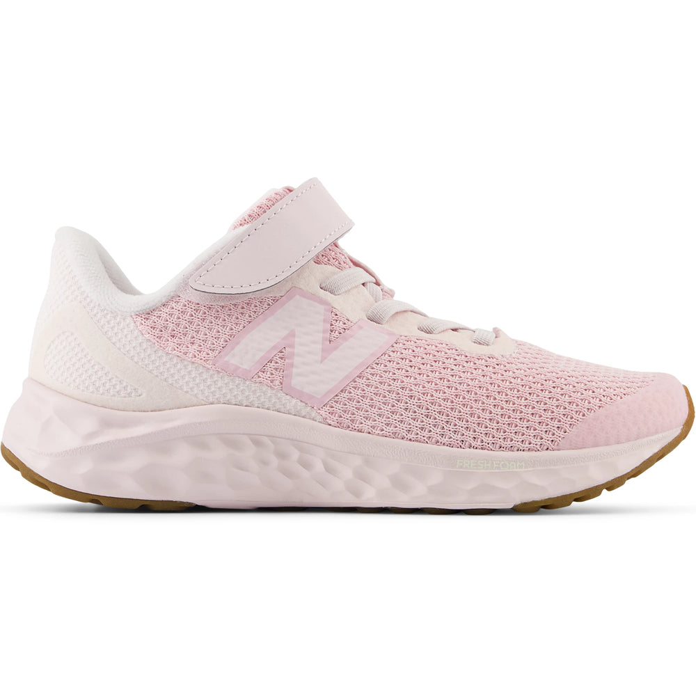 Side of New Balance Kids' Fresh Foam Arishi v4 running shoe in Pink Granite/Mid Century Pink