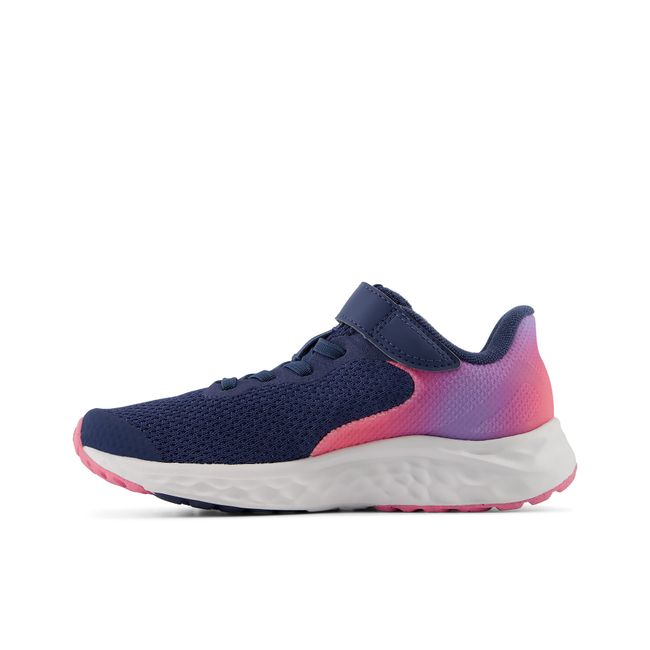 Medial profile of New Balance Kids' Fresh Foam Arishi V4 in indigo blue and hot pink