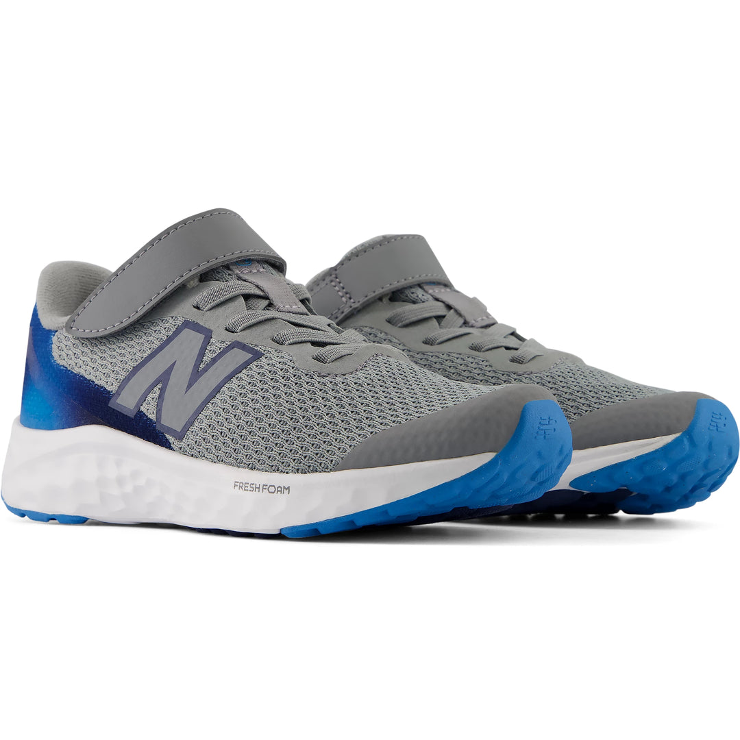 Pair of New Balance Kids' Fresh Foam Arishi v4 running shoes in Slate Grey/Altitude/NB Navy