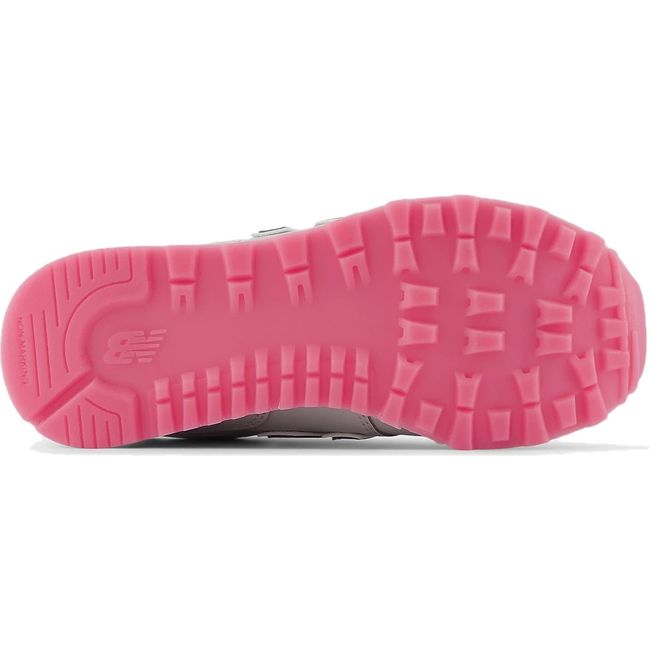 Sole of Little Kids New Balance 574 Lifestyle Sneaker in Gray and Pink