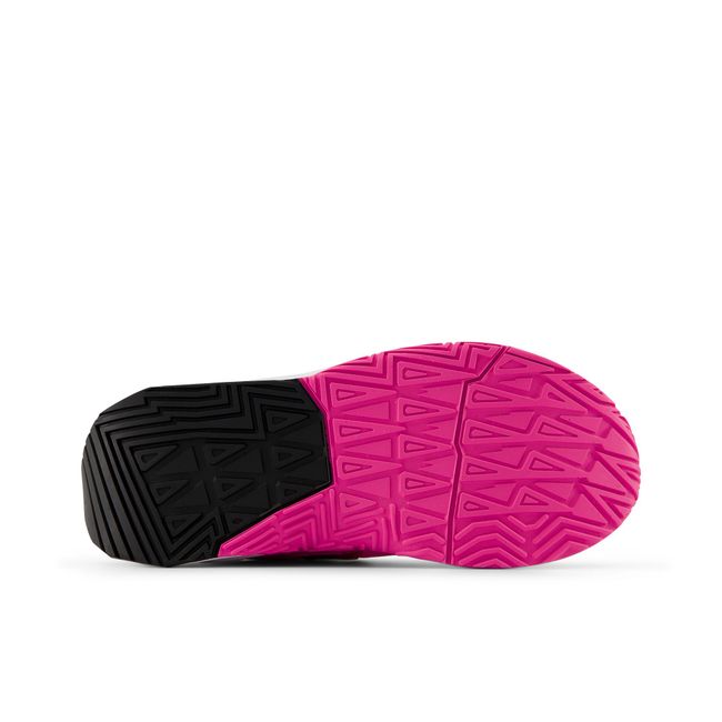New Balance FuelCell Play kids shoe outsole tread view.