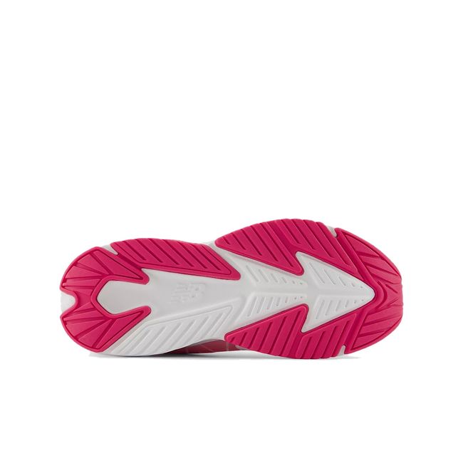 White and pink sole of New Balance Kids' Rave Run V2 Running Shoe in Rose Sugar Pink