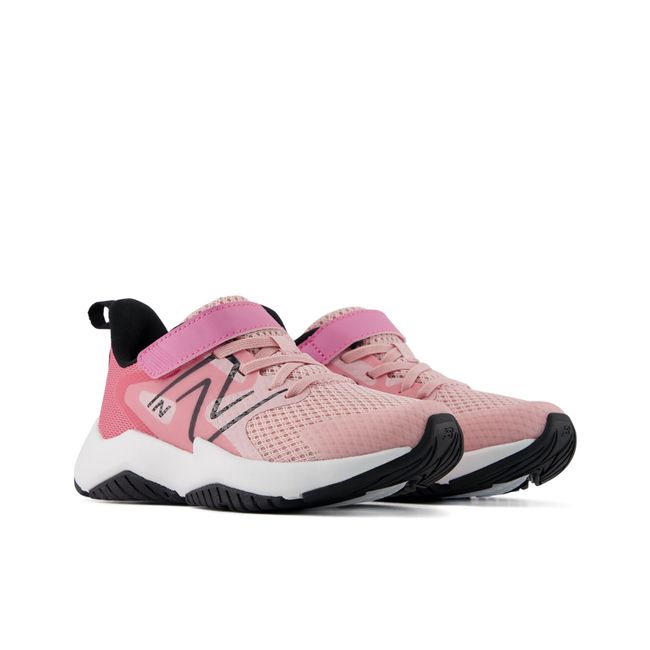 Pair of New Balance Rave Run v2 kids sneakers in blush and bright pink