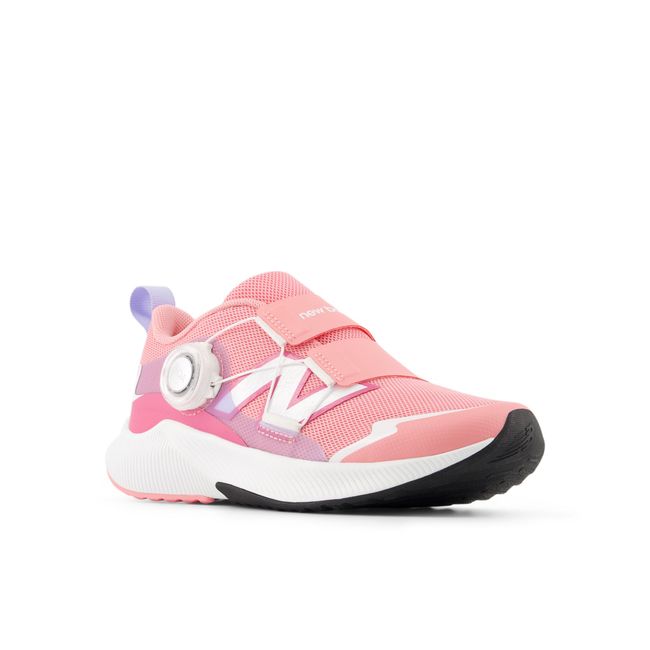 Pair of New Balance Reveal v4 BOA kids sneakers in coral pink and lilac