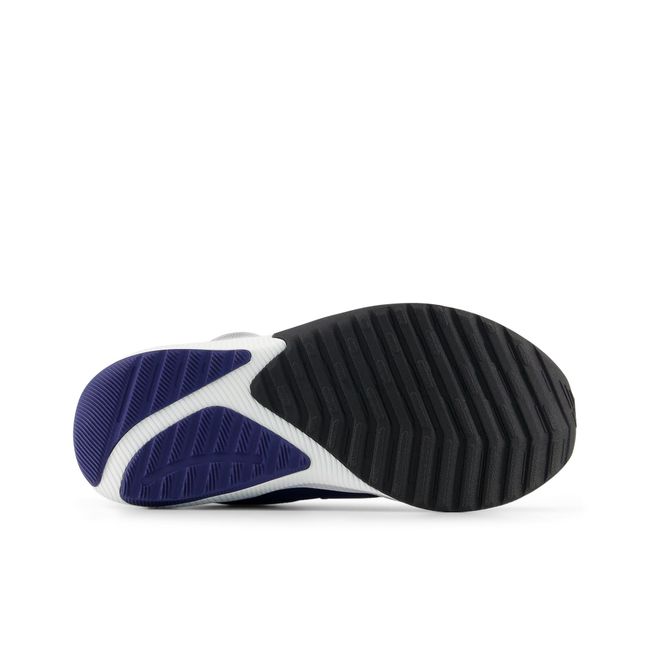 New Balance DynaSoft Reveal V4 BOA kids shoe outsole tread view.