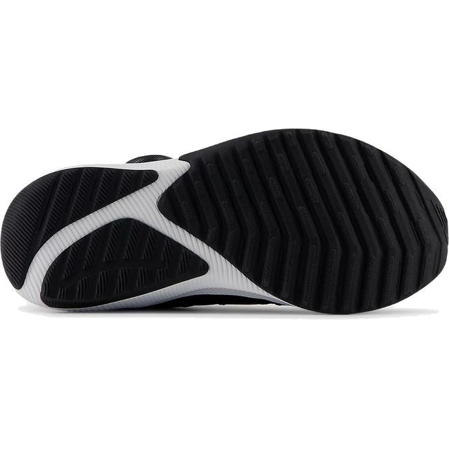 Sole of New Balance Little Kids DynaSoft Reveal V4 BOA Running Shoe in Black pink and purple