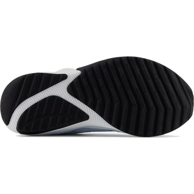 Sole of New Balance Little Kids' DynaSoft Reveal V4 BOA Running Shoe in ice blue and pink