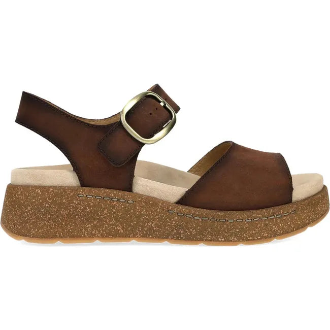 Lateral side of Women's Dansko Bianca Sandal in brown suede with cork platform sole