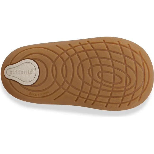 Sole of Kids Stride Rite Gigi Boot in taupe with tan outsole