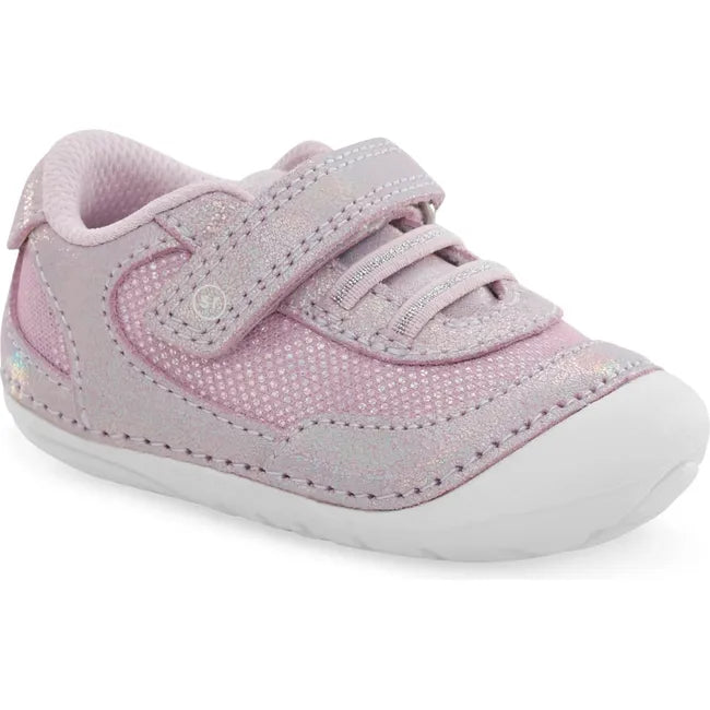 Front angled view of Kids Stride Rite Jazzy Sneaker in purple with a velcro strap and white sole