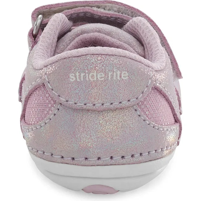 Heel of Kids Stride Rite Jazzy Sneaker in purple with a velcro strap and white sole