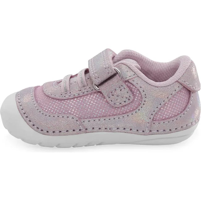 Medial side of Kids Stride Rite Jazzy Sneaker in purple with a velcro strap and white sole