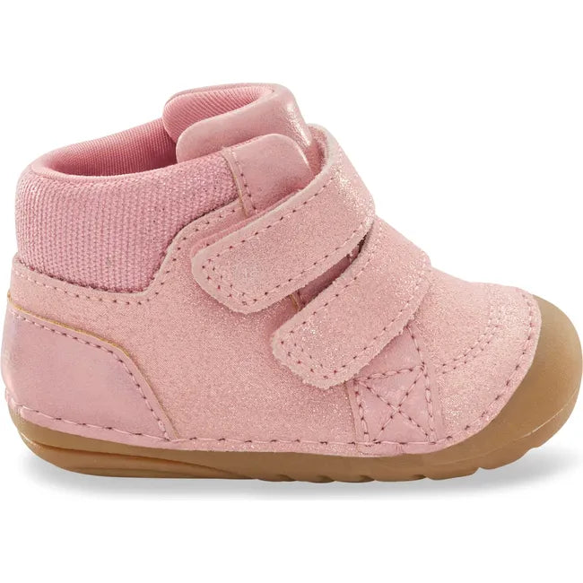 Lateral side of Stride Rite Kids Shoes Martin Boot in pink with two velcro straps and tan sole