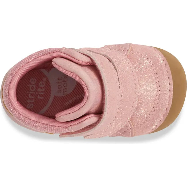 Top of Stride Rite Kids Shoes Martin Boot in pink with two velcro straps and tan sole