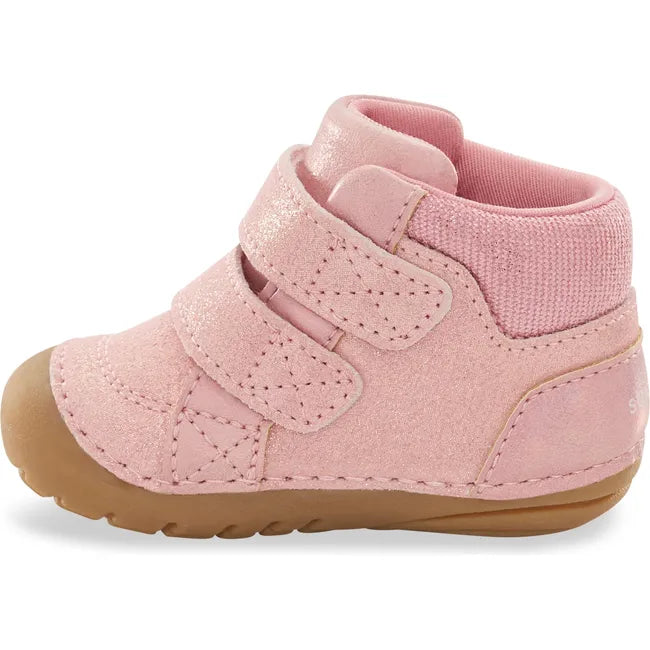 Medial side of Stride Rite Kids Shoes Martin Boot in pink with two velcro straps and tan sole