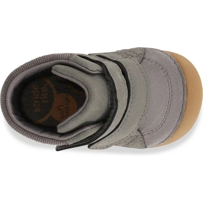 Top of Stride Rite Kids Shoes Martin Boot in grey with two velcro straps and tan sole