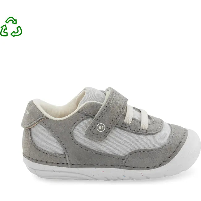 Lateral side of Infant Stride Rite Kids' Sprout Sneaker in Light Grey with velcro strap