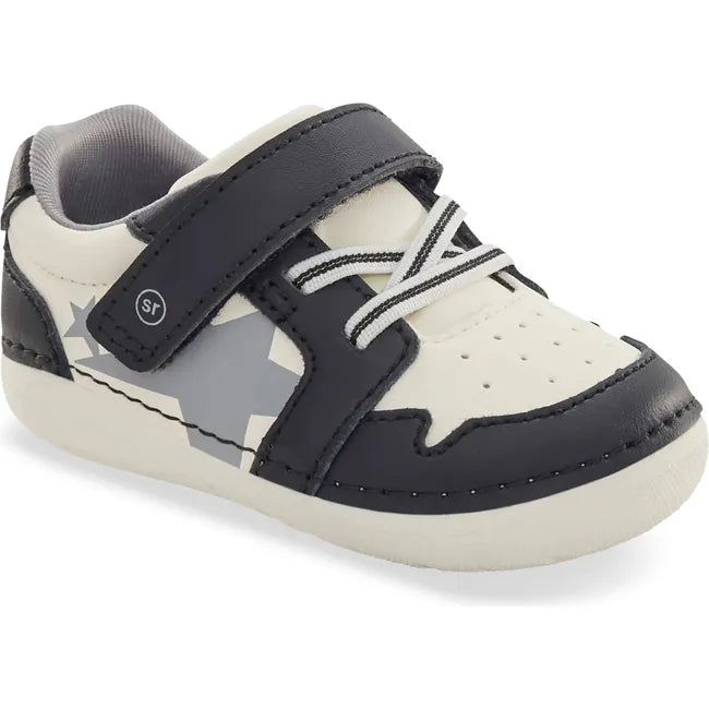Front angled view of Kids Stride Rite Waverly Sneaker in black and white with velcro strap