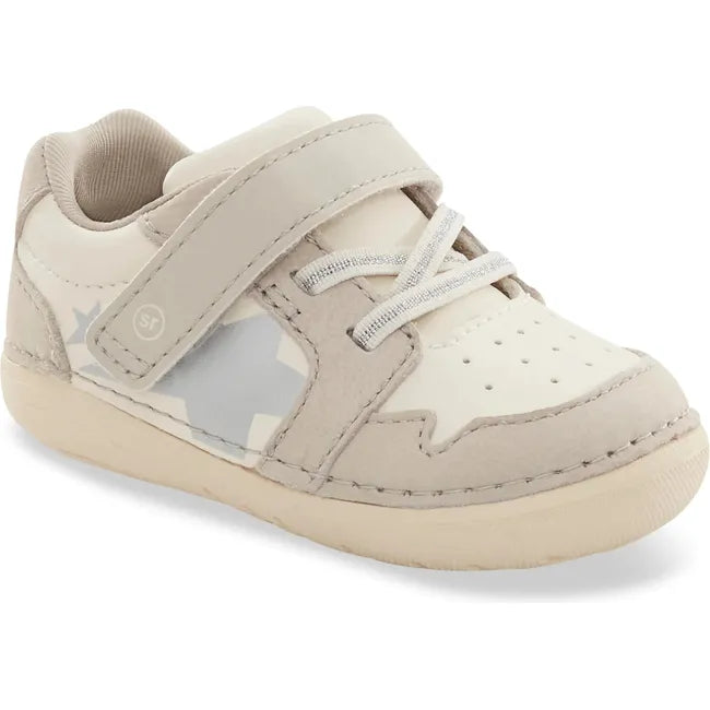 Front angled view of Kids Stride Rite Waverly Sneaker in ecru beige and white with velcro strap