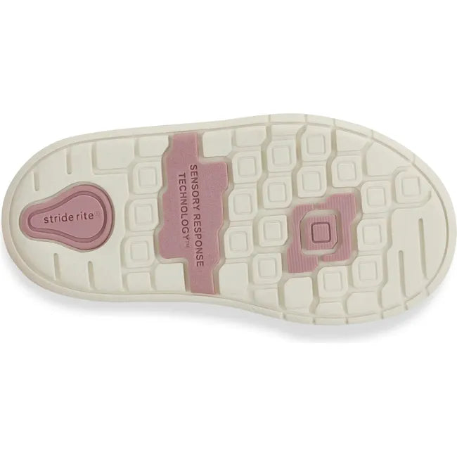 Sole of Kids Ames Stride Rite High Top Sneaker in pink upper with a white outsole