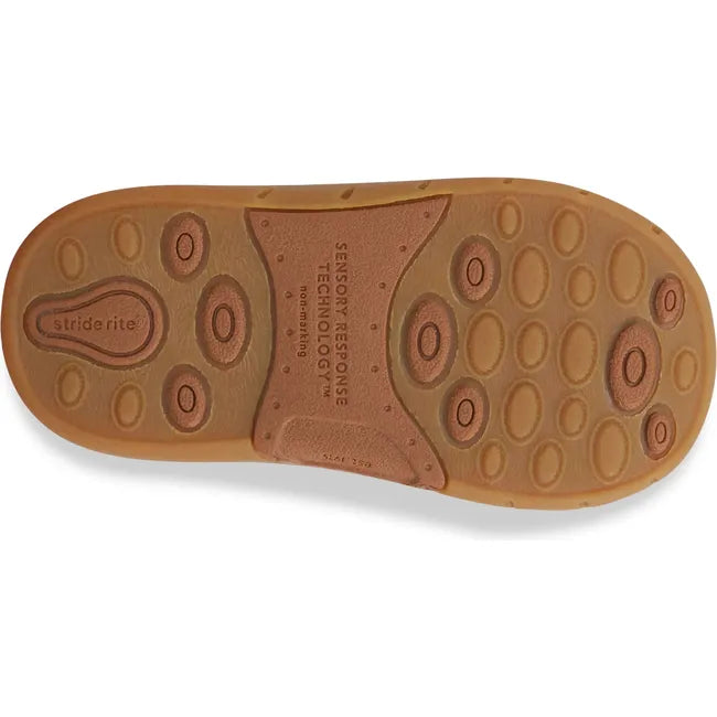 Sole of Stride Rite Shoes Kids Lena Ankle Boot in hazel brown leather with brown sole