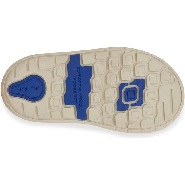 Sole of Little Kids' Stride Rite London Sneaker in White and Blue