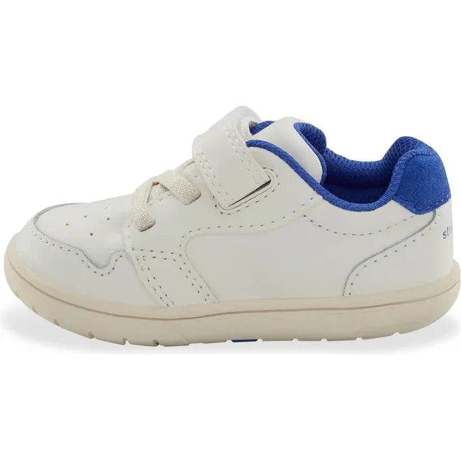 Medial side of Little Kids' Stride Rite London Sneaker in White and Blue with velcro strap