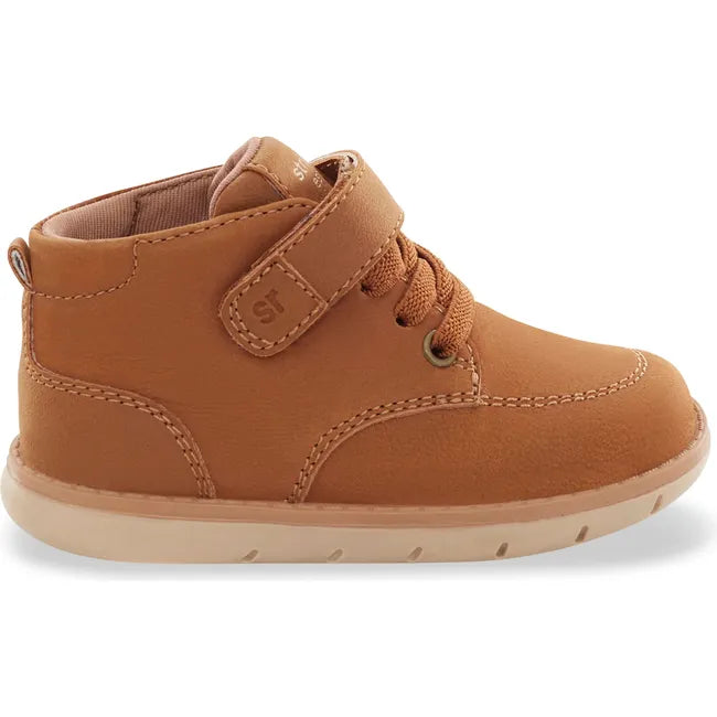 Lateral side of Stride Rite Baby Boot Quinn in hazel tan leather with a velcro strap and faux laces