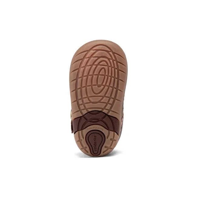 Sole of of Stride Rite Soft Motion Mara Mini Mary Jane Shoe in Cedar Brown