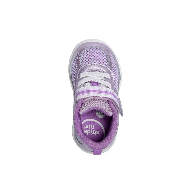 Upper of Stride Rite Kids’ Ian 2.0 Sneaker in Purple with velcro strap and elastic bands