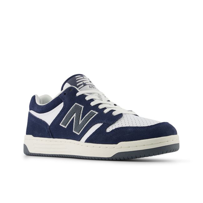 Pair of New Balance 480 retro basketball sneakers in navy and white