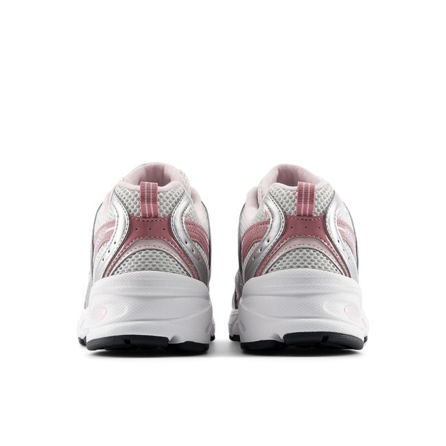 New Balance 530 sneaker in silver metallic, heel view.