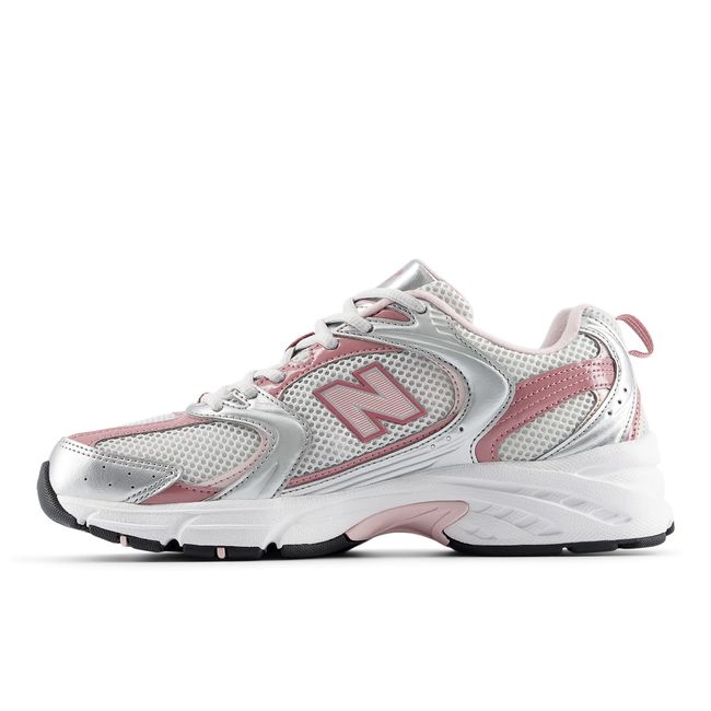 New Balance 530 sneaker in silver metallic, medial profile.